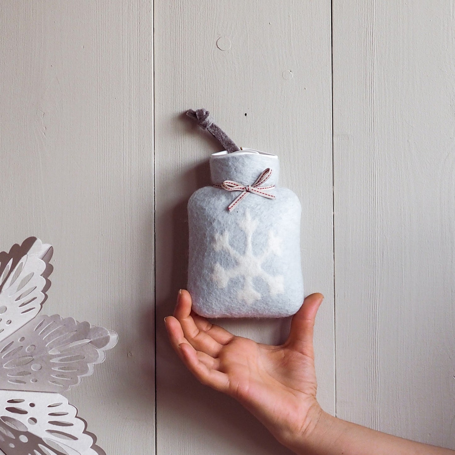Mini Wärmflasche Schneeflocke hellblau weiss