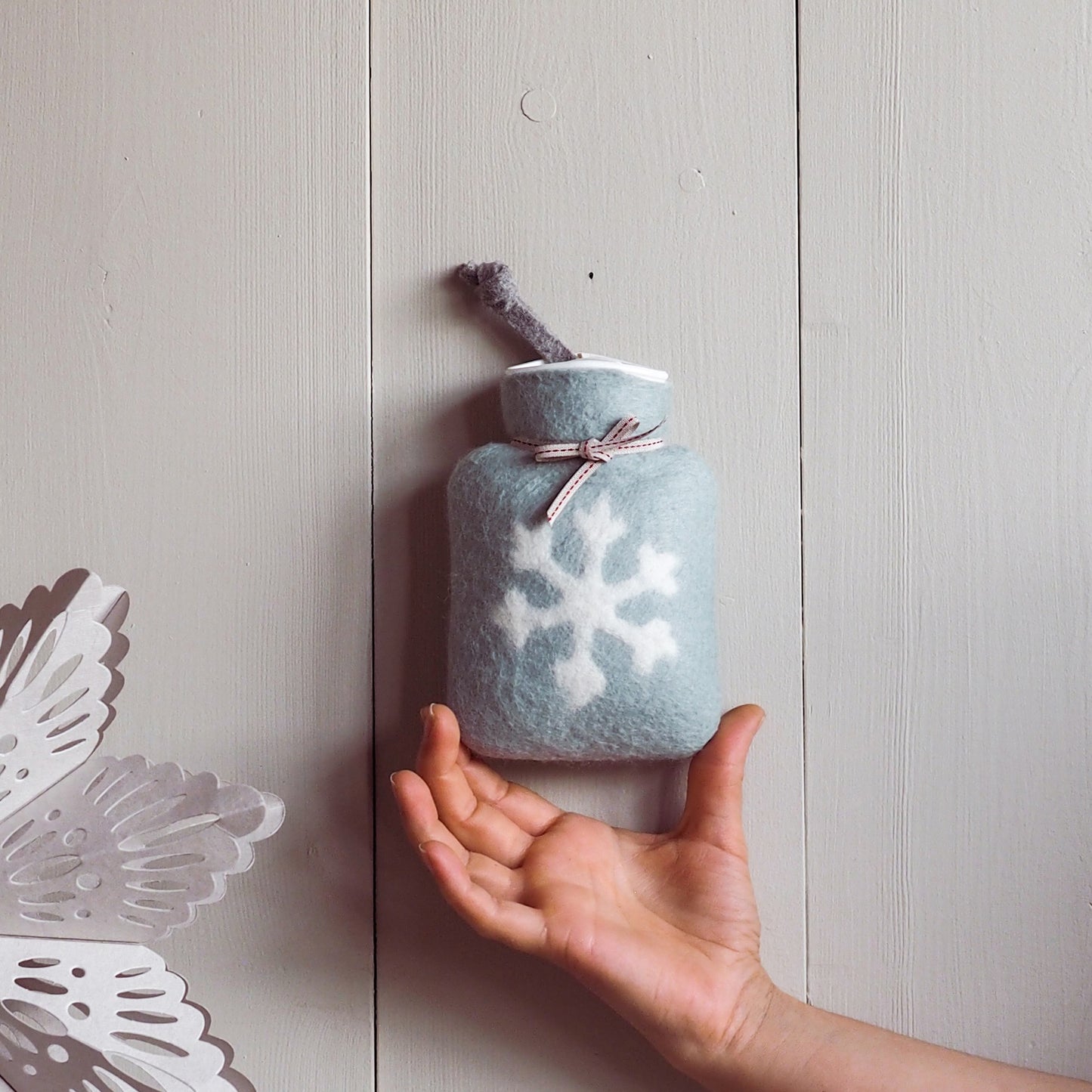 Mini Wärmflasche Schneeflocke türkis weiss